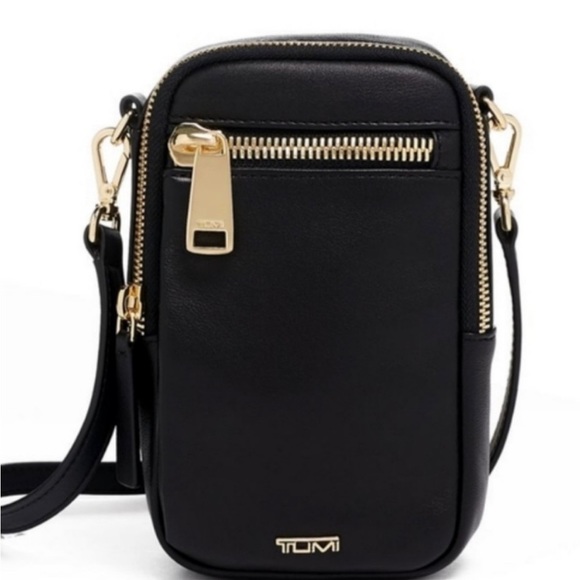 Tumi Handbags - NWT TUMI VOYAGEUR KATY leather crossbody
